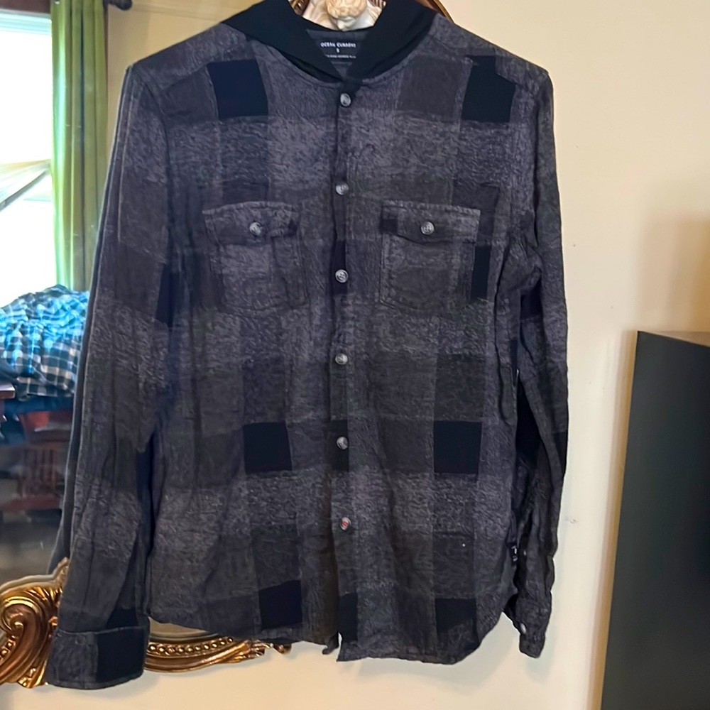 A button-down shirt with a hood, designed to keep your head warm and toasty.